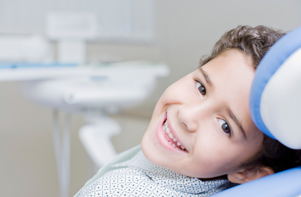 Young boy smiling with healthy teeth at Greashaber Dentistry in Ann Arbor, MI 48104-3811